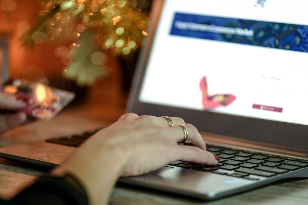 Woman typing in a greeting card